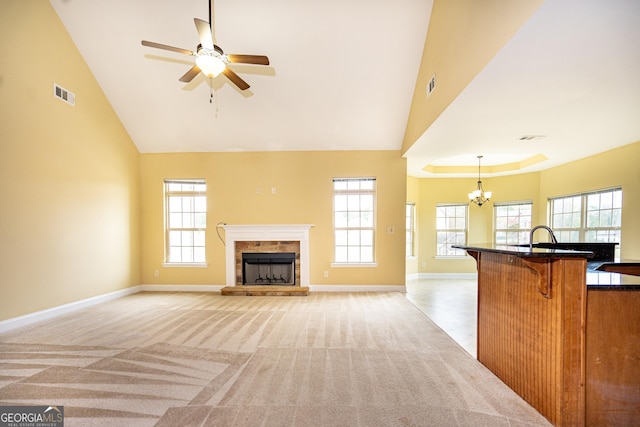 104 Hamilton Lake View Ct, Lagrange, GA 30241 - unfurnished living room with high vaulted ceiling, baseboards, light carpet, a ceiling fan, and healthy amount of natural light