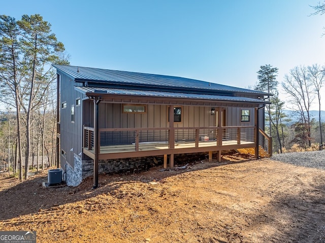 538 Mountain Laurel Rdg, Mineral Bluff, GA 30559 - rear view of house with central AC unit, metal roof, and board and batten siding