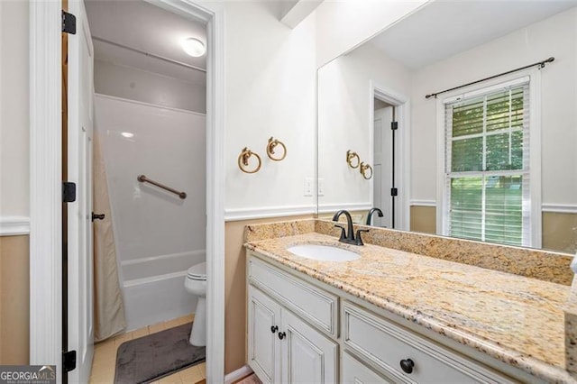4458 Trickum Rd, Marietta, GA 30066 - full bathroom with vanity, toilet, and shower / bathtub combination