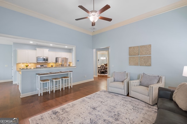 2245 Long Bow Chase, Kennesaw, GA 30144 - living room with crown molding, ceiling fan, dark wood-style floors, baseboards, and recessed lighting