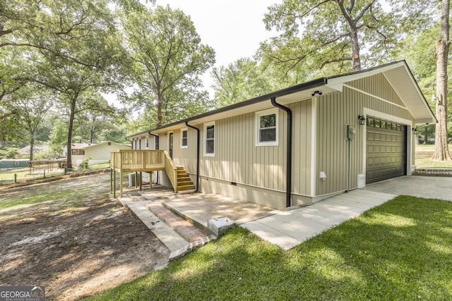 1017 Oak Ridge Dr, Byron, GA 31008 - view of front of house with stairway and a wooden deck