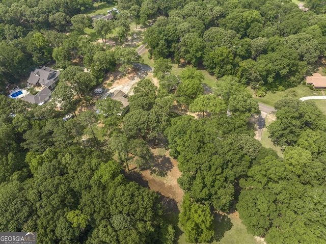 1017 Oak Ridge Dr, Byron, GA 31008 - aerial view of property and surrounding area featuring a forest