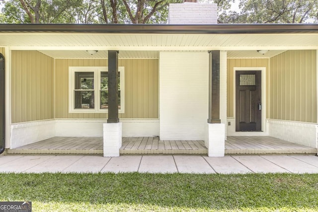 1017 Oak Ridge Dr, Byron, GA 31008 - entrance to property with covered porch and a chimney