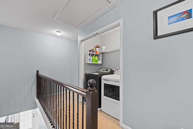 154 Stephens Mill Dr, Dallas, GA 30157 - laundry room with attic access, washing machine and clothes dryer, and light carpet