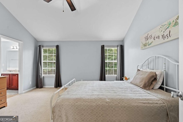 154 Stephens Mill Dr, Dallas, GA 30157 - bedroom featuring lofted ceiling, multiple windows, light colored carpet, connected bathroom, and ceiling fan