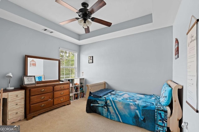 154 Stephens Mill Dr, Dallas, GA 30157 - bedroom with carpet floors, a tray ceiling, and a ceiling fan