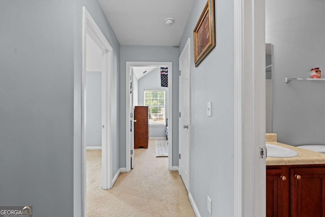 154 Stephens Mill Dr, Dallas, GA 30157 - corridor featuring light carpet and baseboards