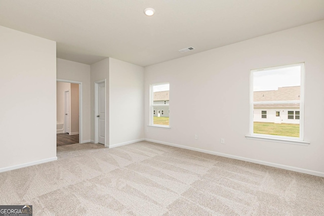 268 Oliver Dr, Locust Grove, GA 30248 - empty room featuring light carpet, baseboards, and recessed lighting