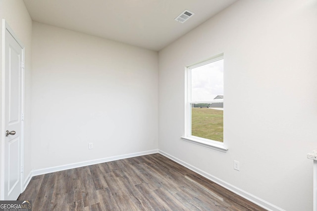 268 Oliver Dr, Locust Grove, GA 30248 - spare room with dark wood finished floors and baseboards
