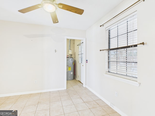 292 Whitetail Cir, Hinesville, GA 31313 - tiled empty room with electric water heater and a ceiling fan
