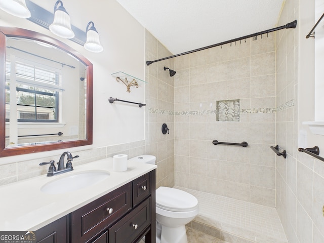 292 Whitetail Cir, Hinesville, GA 31313 - full bathroom with a tile shower, vanity, and tile walls