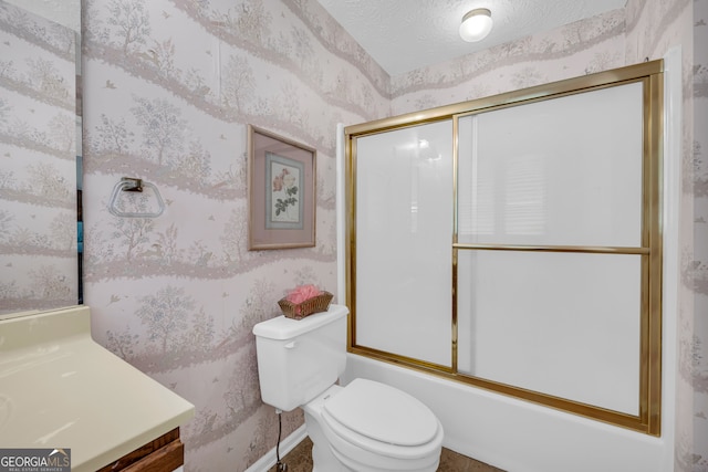 327 Brucken Strasse Unit 609, Helen, GA 30545 - full bathroom with vanity, wallpapered walls, toilet, combined bath / shower with glass door, and a textured ceiling