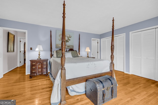 327 Brucken Strasse Unit 609, Helen, GA 30545 - bedroom with wood finished floors, multiple closets, and baseboards