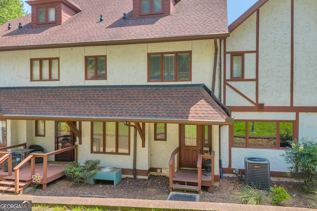 327 Brucken Strasse Unit 609, Helen, GA 30545 - back of house with central AC, stucco siding, a shingled roof, and a deck