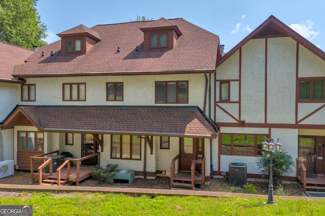 327 Brucken Strasse Unit 609, Helen, GA 30545 - rear view of house with stucco siding, central AC unit, a cooling unit, a wooden deck, and a shingled roof