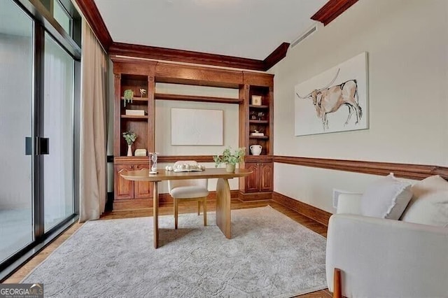 750 Park Ave NE Unit 6E, Atlanta, GA 30326 - office area featuring ornamental molding, light wood-style flooring, and built in features