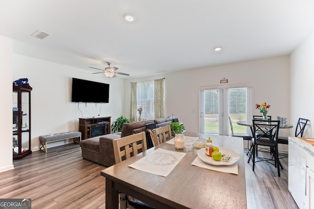 124 Saginaw Ct, Locust Grove, GA 30248 - dining room featuring light wood-style flooring, a ceiling fan, and recessed lighting
