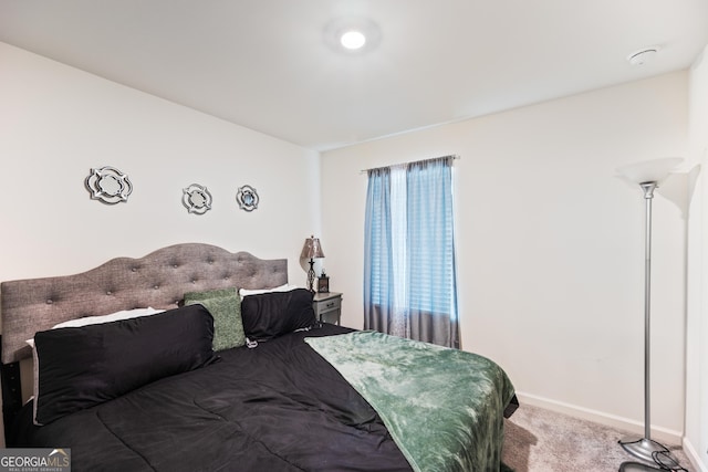 124 Saginaw Ct, Locust Grove, GA 30248 - carpeted bedroom featuring baseboards