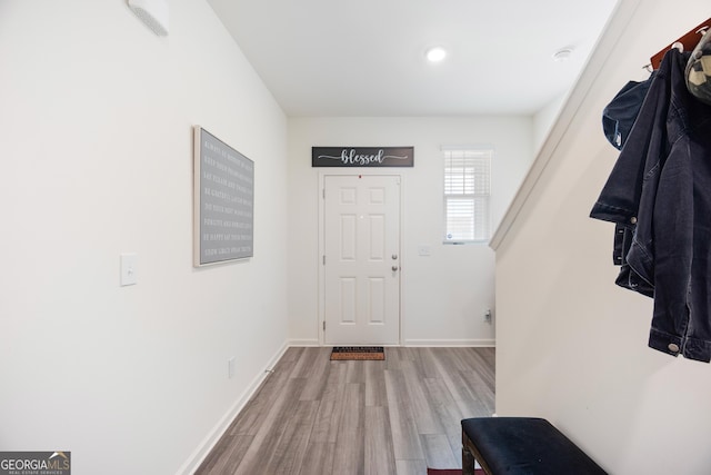 124 Saginaw Ct, Locust Grove, GA 30248 - foyer entrance with wood finished floors, baseboards, and recessed lighting