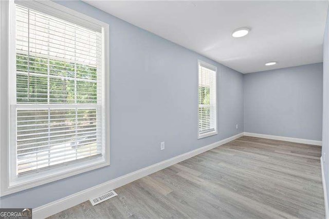 2158 Huckleberry Ln, Lithia Springs, GA 30122 - spare room with baseboards and wood finished floors