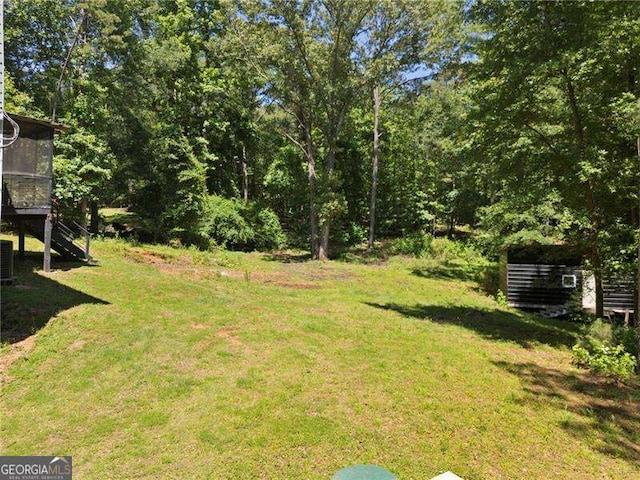 2158 Huckleberry Ln, Lithia Springs, GA 30122 - view of green lawn featuring cooling unit