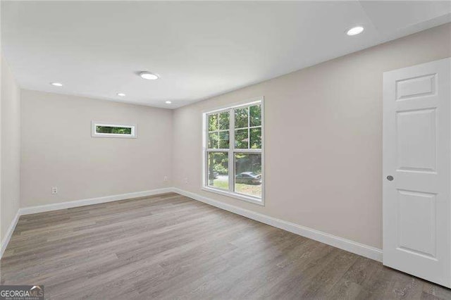 2158 Huckleberry Ln, Lithia Springs, GA 30122 - spare room with baseboards, wood finished floors, and recessed lighting