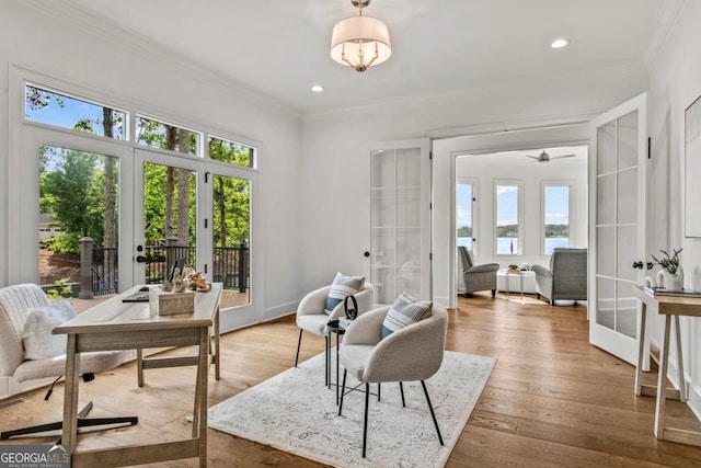 117 W View Way, Eatonton, GA 31024 - sitting room featuring french doors, plenty of natural light, ornamental molding, a water view, and recessed lighting