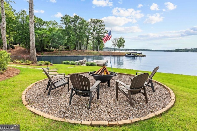 117 W View Way, Eatonton, GA 31024 - view of grassy yard featuring a fire pit, a water view, and a dock