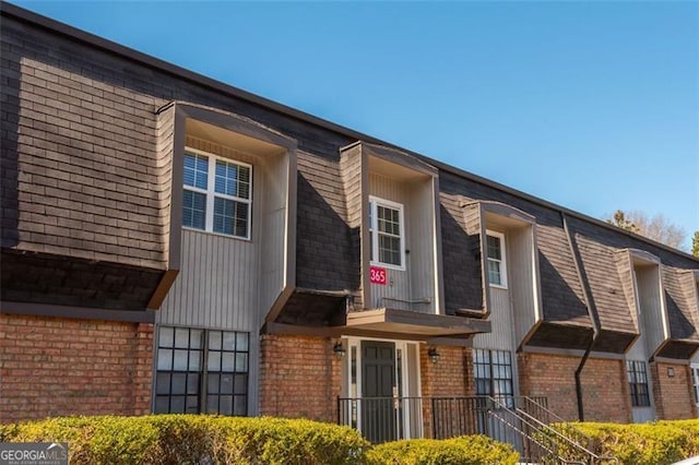 365 Winding River Dr Unit # E, Atlanta, GA 30350 - view of property exterior with brick siding