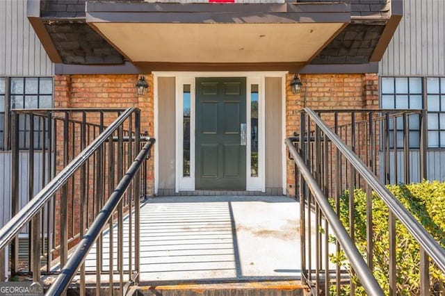 365 Winding River Dr Unit # E, Atlanta, GA 30350 - view of exterior entry featuring brick siding