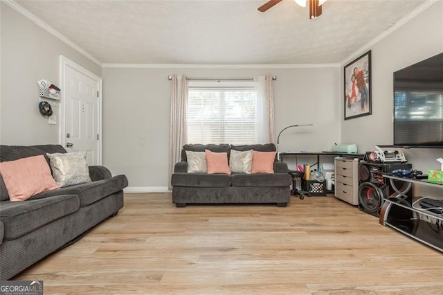 365 Winding River Dr Unit # E, Atlanta, GA 30350 - living area featuring wood finished floors, a ceiling fan, crown molding, and baseboards