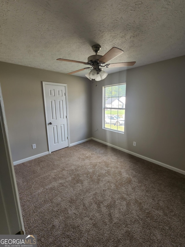 170 Inverness Trce, Riverdale, GA 30274 - unfurnished room with a ceiling fan, baseboards, carpet, and a textured ceiling