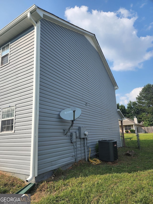 170 Inverness Trce, Riverdale, GA 30274 - view of property exterior featuring cooling unit and a lawn