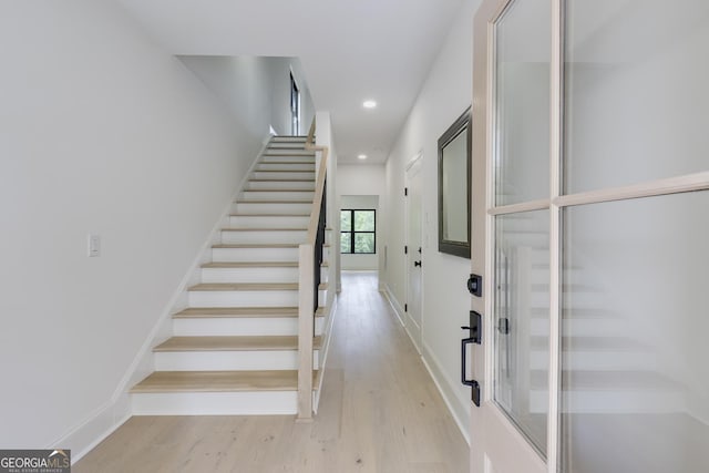 2745 S Bamby Ln NE, Brookhaven, GA 30319 - staircase with wood finished floors, recessed lighting, and baseboards