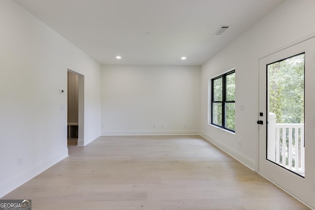 2745 S Bamby Ln NE, Brookhaven, GA 30319 - unfurnished room with light wood-style flooring, recessed lighting, and baseboards