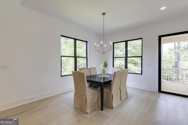 2745 S Bamby Ln NE, Brookhaven, GA 30319 - dining space with healthy amount of natural light, light wood-type flooring, a chandelier, baseboards, and recessed lighting