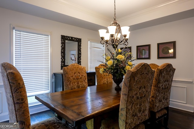 8035 Magnolia Way, Roswell, GA 30075 - dining space featuring a chandelier, dark wood-type flooring, ornamental molding, and wainscoting
