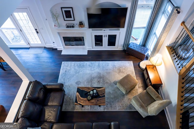 8035 Magnolia Way, Roswell, GA 30075 - living area featuring wood finished floors, healthy amount of natural light, and baseboards