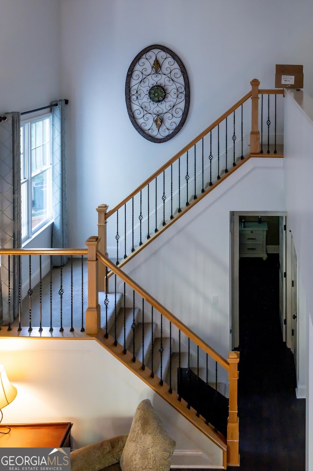 8035 Magnolia Way, Roswell, GA 30075 - staircase featuring baseboards