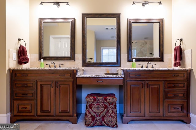 8035 Magnolia Way, Roswell, GA 30075 - bathroom featuring double vanity and tasteful backsplash