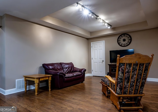 8035 Magnolia Way, Roswell, GA 30075 - living area with track lighting, baseboards, a raised ceiling, and wood finished floors