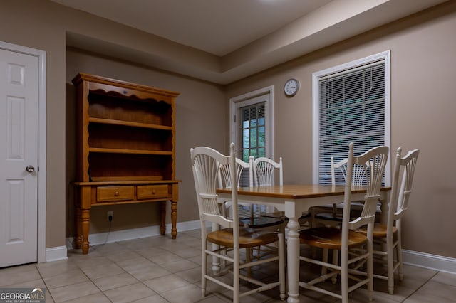 8035 Magnolia Way, Roswell, GA 30075 - dining area with light tile patterned floors and baseboards