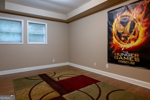8035 Magnolia Way, Roswell, GA 30075 - unfurnished room featuring dark wood-type flooring, baseboards, and a raised ceiling