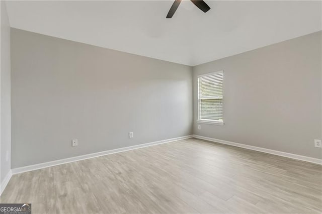 766 Chapman St, Jonesboro, GA 30238 - empty room featuring ceiling fan, wood finished floors, baseboards, and lofted ceiling