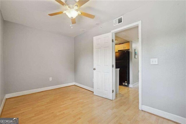 377 Ralph Mcgill Blvd NE Unit C, Atlanta, GA 30312 - unfurnished room featuring light wood finished floors and ceiling fan