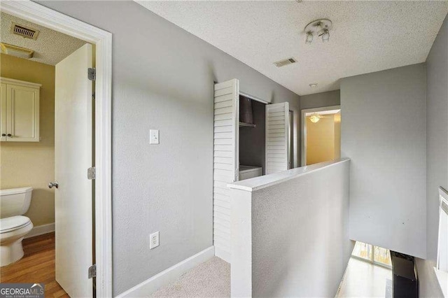 377 Ralph Mcgill Blvd NE Unit C, Atlanta, GA 30312 - hall with a textured ceiling and an upstairs landing
