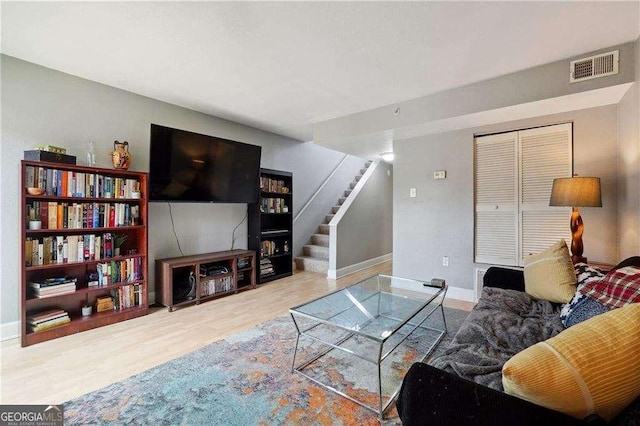 377 Ralph Mcgill Blvd NE Unit C, Atlanta, GA 30312 - living room with stairway and wood finished floors