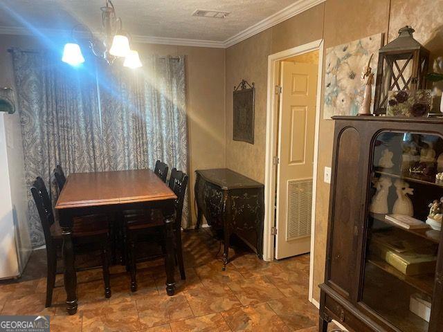 1167 Underwood, Sparta, GA 31087 - dining room featuring ornamental molding