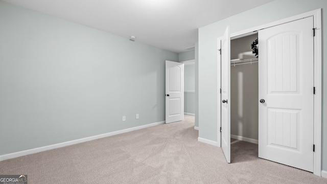 572 Boulder View Pkwy, Dallas, GA 30157 - unfurnished bedroom with carpet flooring, a closet, and baseboards