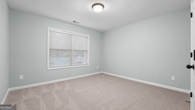 572 Boulder View Pkwy, Dallas, GA 30157 - carpeted spare room featuring baseboards